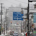 写真: 雪降る町