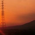 写真: 鉄塔と夕日