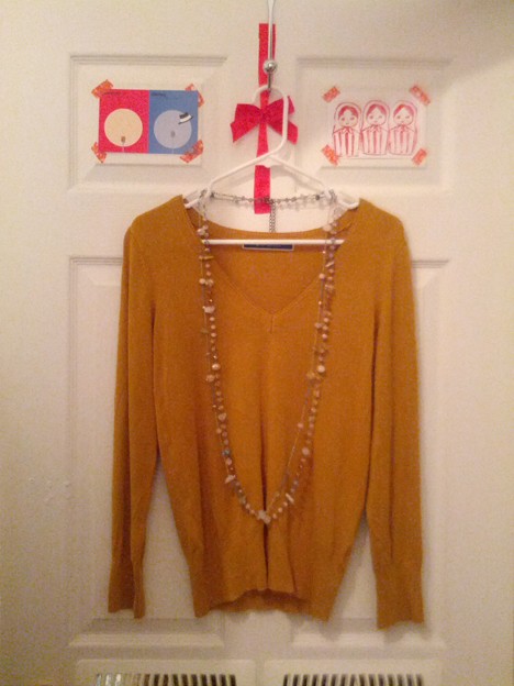 #1-knit sweater from THE EMPORIUM.($15-)