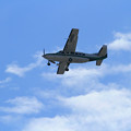 写真: 自宅上空を通過していったCessna208（2012/10/13）