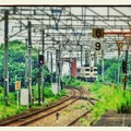 写真: 川尻駅に接近する三角線の列車。