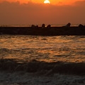 写真: 夕陽と波?