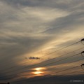 写真: 鉄塔と二つの夕陽