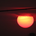写真: 夕陽に斑点が薄く